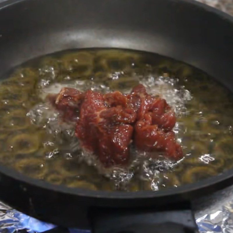 Step 4 Frying beef for grilled beef pho