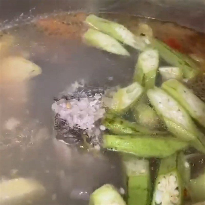 Step 5 Cooking grouper sour soup with shredded gourd