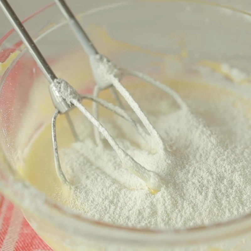 Step 3 Mix the yogurt cheese mixture for baked yogurt cheesecake