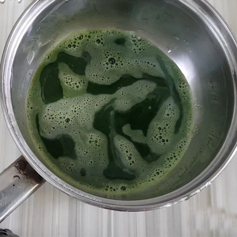 Step 2 Blend the water spinach and cook the porridge Frog porridge with water spinach