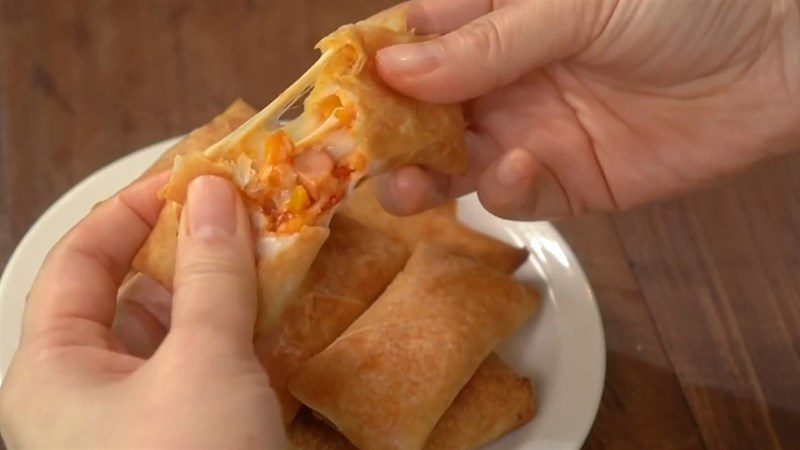 Cheese sausage roll pizza