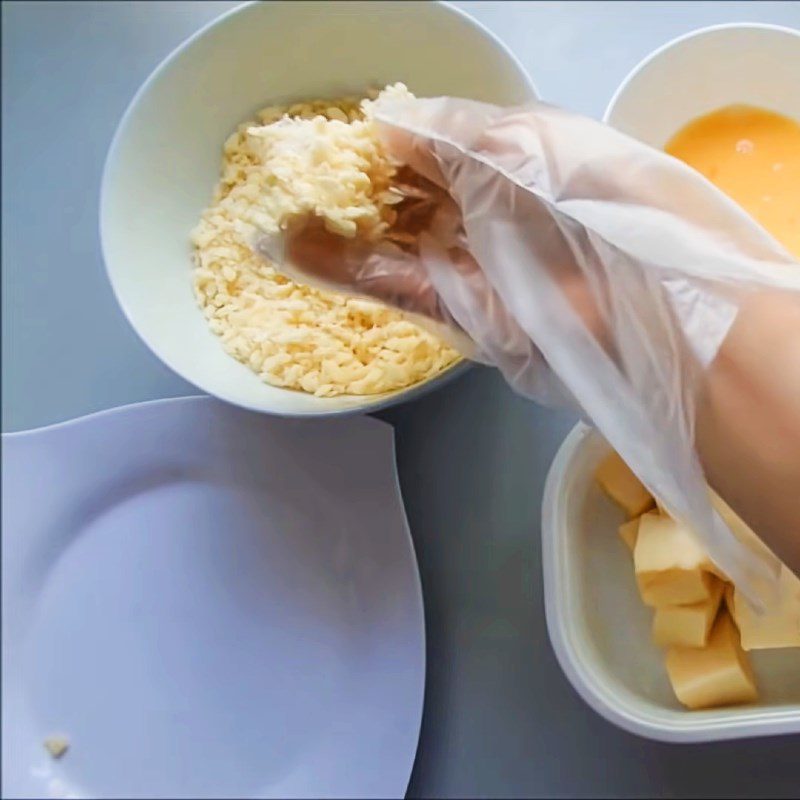 Step 3 Coating the cake with batter Fresh milk cake fried with flour