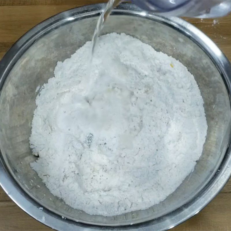 Step 1 Mixing the dough for bread without baking powder