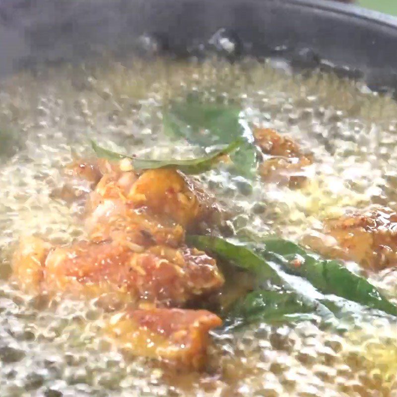 Step 4 Frying pork belly with moc mat leaves