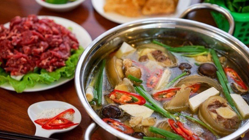 Beef tail hot pot with traditional medicine