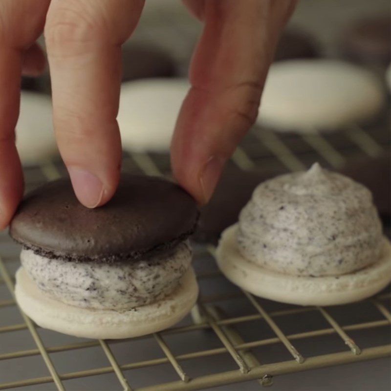 Step 5 Pumping cream filling and completing Oreo macaron