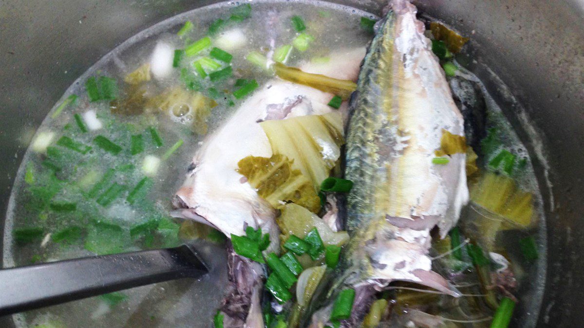 Sour fish soup with pickled vegetables