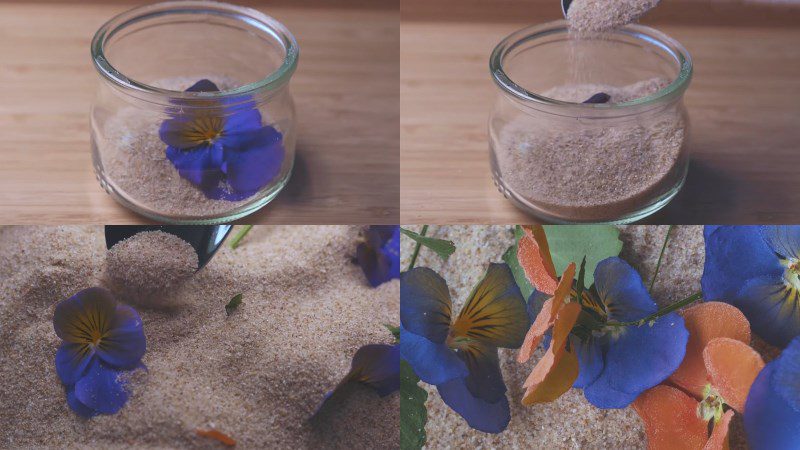 Filling flowers with beach sand