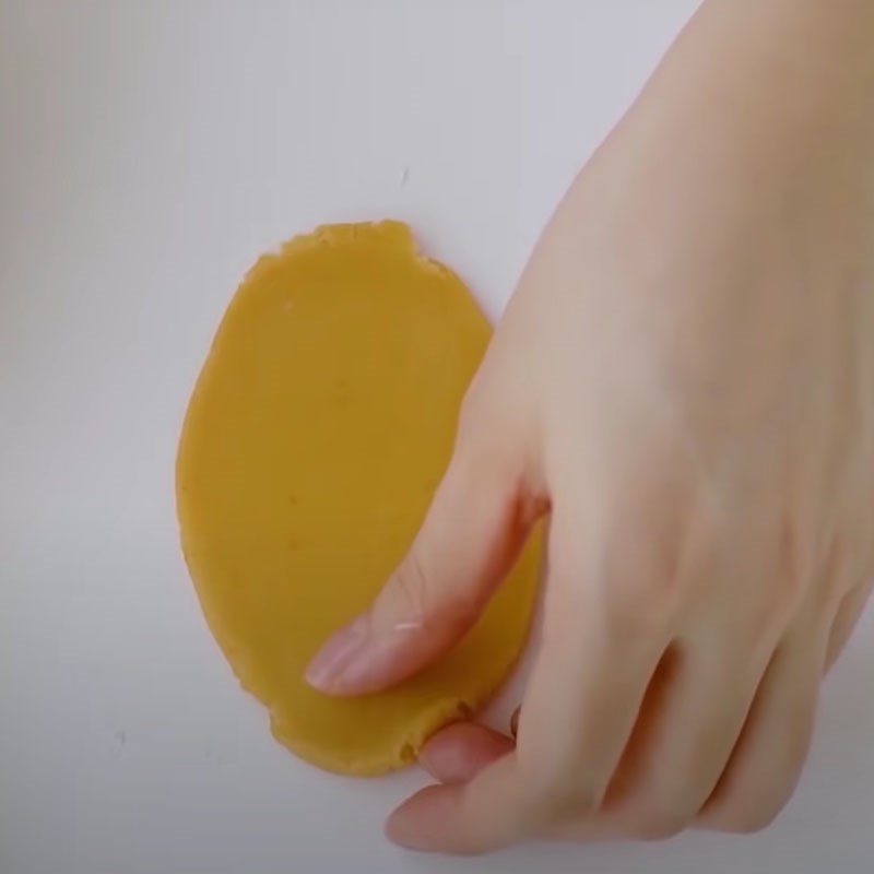 Step 2 Rolling the dough and wrapping the filling Mooncake with durian coconut filling using an air fryer