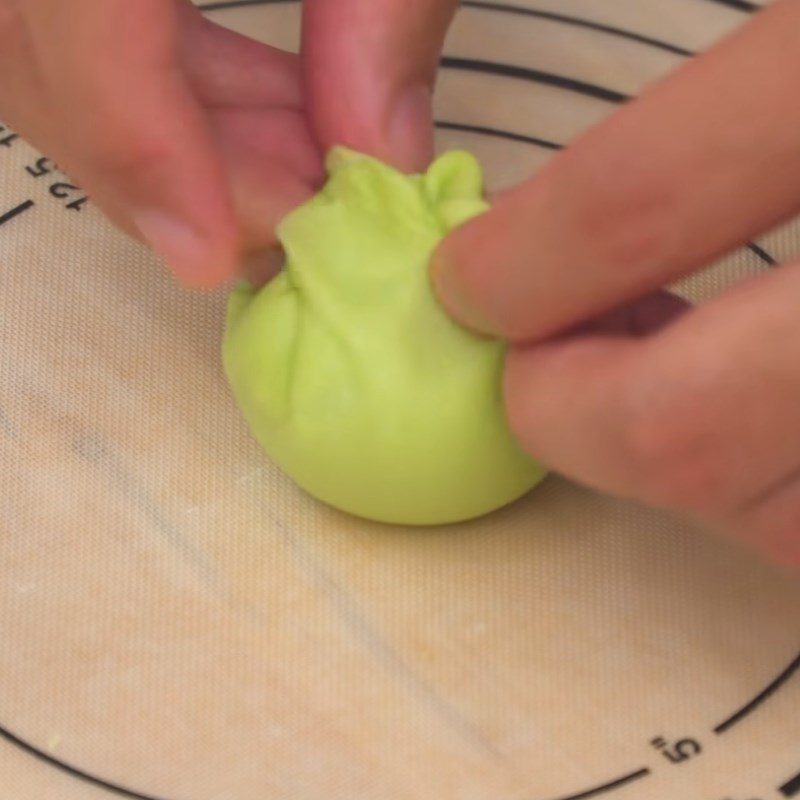 Step 5 Rolling the dough and wrapping the butter filling Butter bun