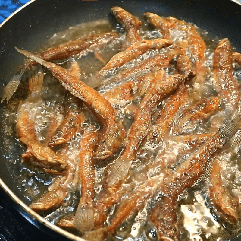 Step 3 Fry fish Fried goby fish with wild betel leaves