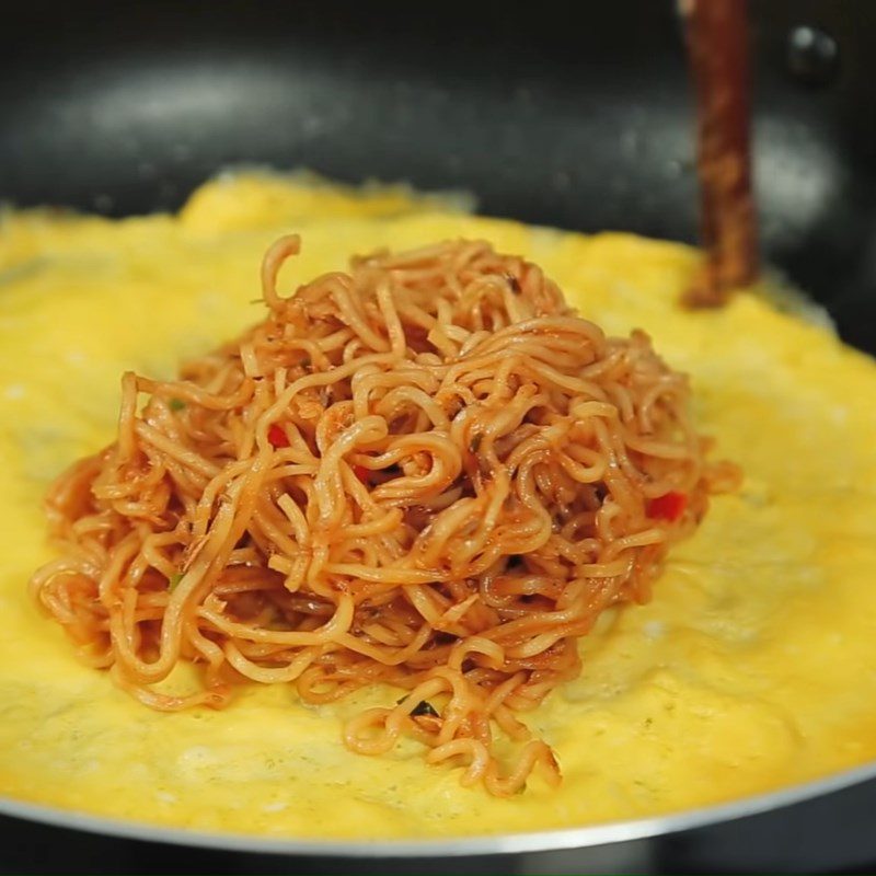 Step 3 Fried and Rolled Eggs Noodles rolled in fried eggs with canned fish