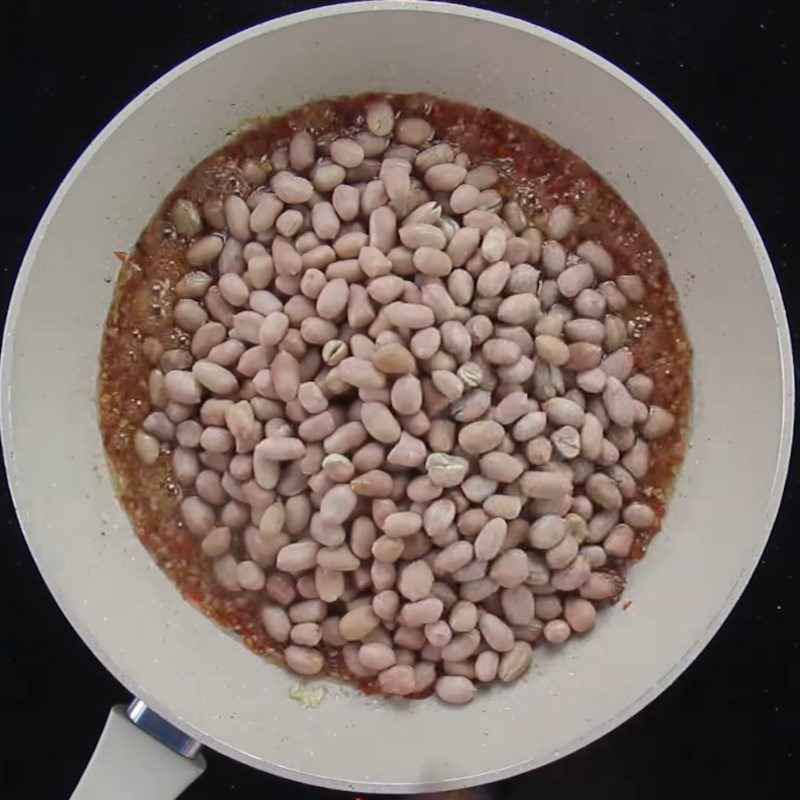 Step 3 Add peanuts Roasted peanuts with fish sauce