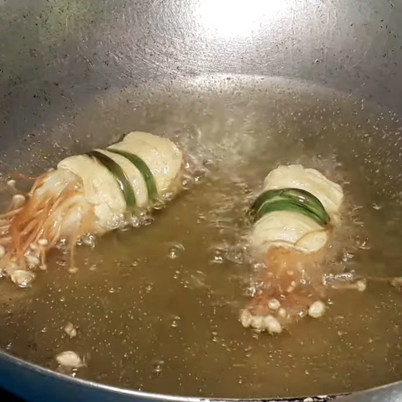 Step 2 Roll the tofu skin Tofu skin rolls with enoki mushrooms and tamarind sauce