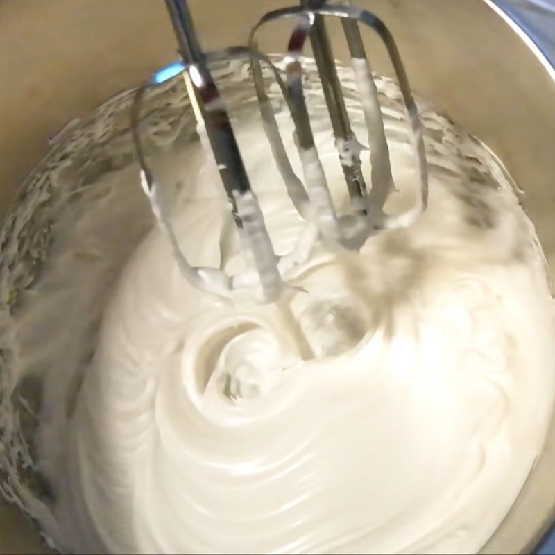 Step 1 Whip the egg whites for Chocolate macarons using flour