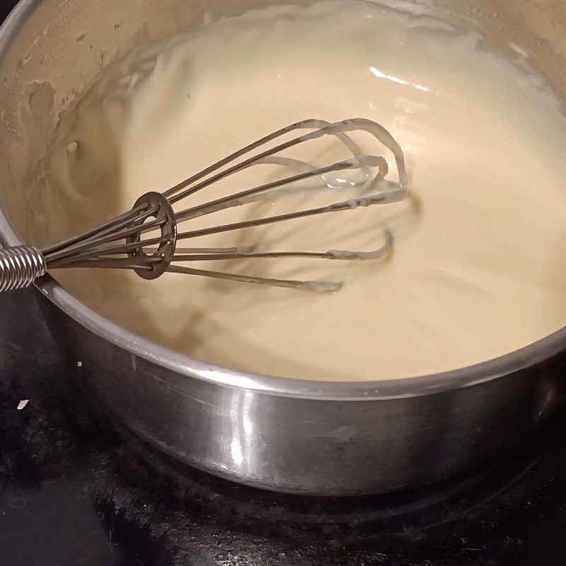 Step 3 Whisking the cheese sauce mixture Cream cheese from fresh milk and Laughing Cow cheese