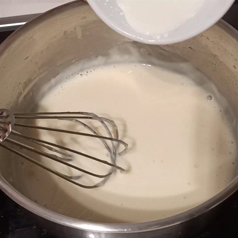 Step 3 Whisking the cheese sauce mixture Cream cheese from fresh milk and Laughing Cow cheese