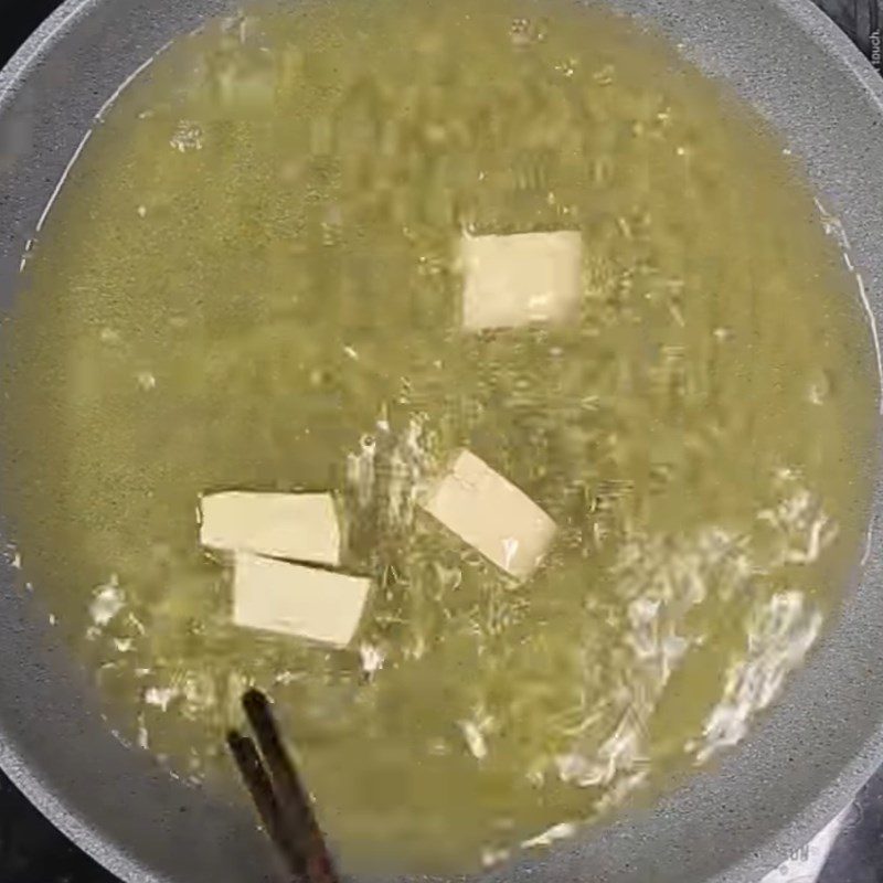 Step 2 Fry the tofu Fried tofu with soy sauce and bell peppers