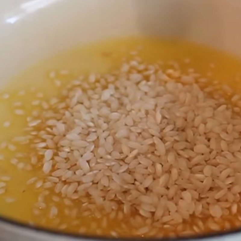 Step 2 Heat the butter rice mixture Rice pudding - Coconut milk mango rice pudding