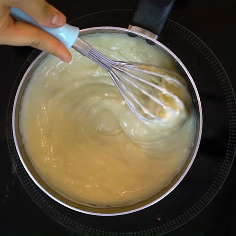 Step 2 Cook the mixture for Coconut Milk Cake without whipping cream