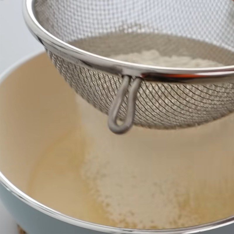 Step 1 Heat and mix flour with lemon zest for Taiwanese yogurt lemon sponge cake