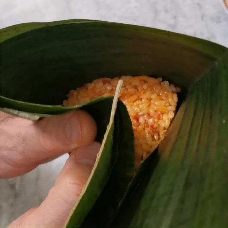 Step 6 Wrapping the cake Gấc coconut cake with mung bean filling