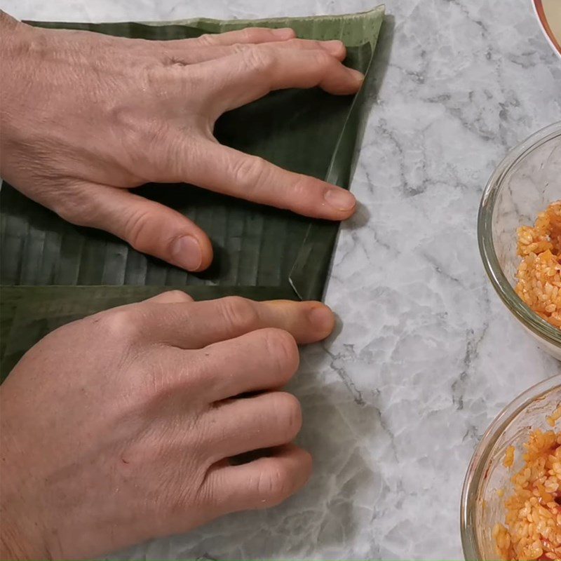 Step 6 Wrapping the cake Gấc coconut cake with mung bean filling