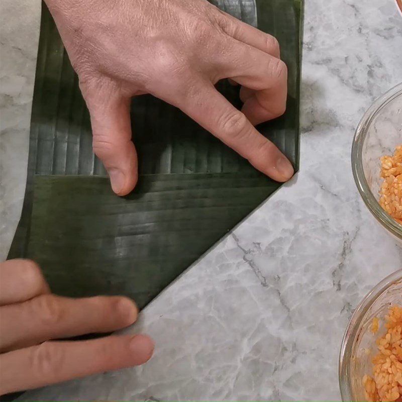 Step 6 Wrapping the cake Gấc coconut cake with mung bean filling