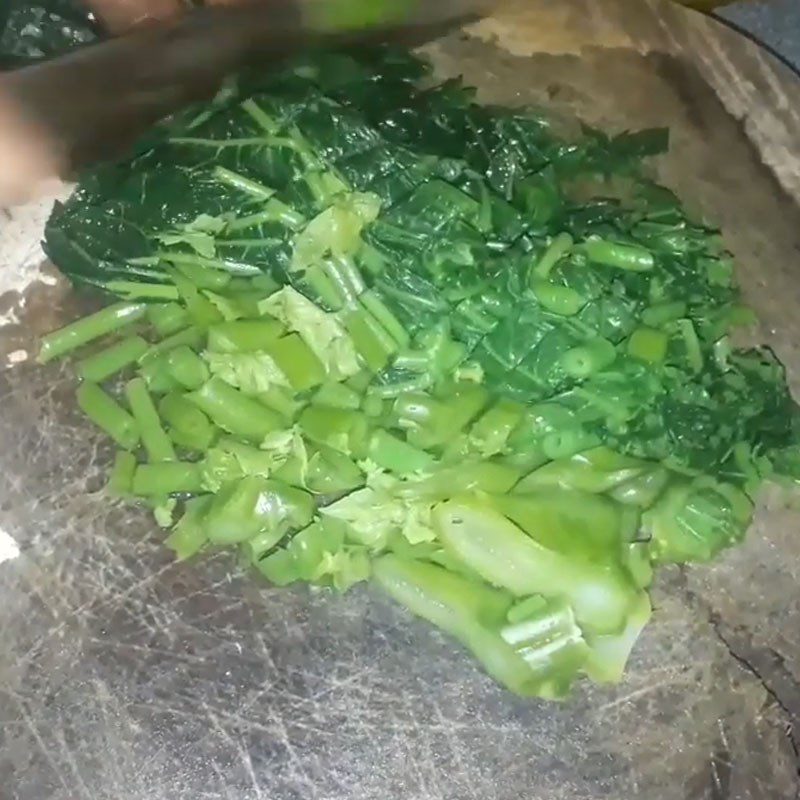 Step 2 Prepare and boil papaya leaves Stir-fried papaya leaves with pork belly