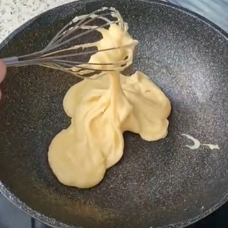 Step 1 Make milk egg filling for Orange Bun