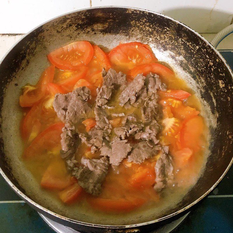 Step 2 Stir-fried beef with tomatoes Stir-fried beef with tomatoes