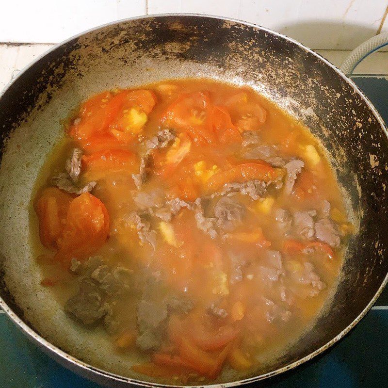 Step 2 Stir-fried beef with tomatoes Stir-fried beef with tomatoes