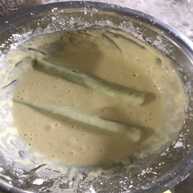 Step 4 Coat with flour and fry the stuffed okra