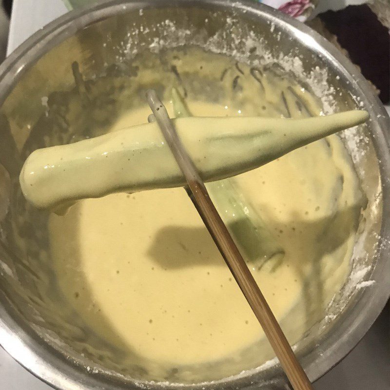 Step 4 Coat with flour and fry the stuffed okra