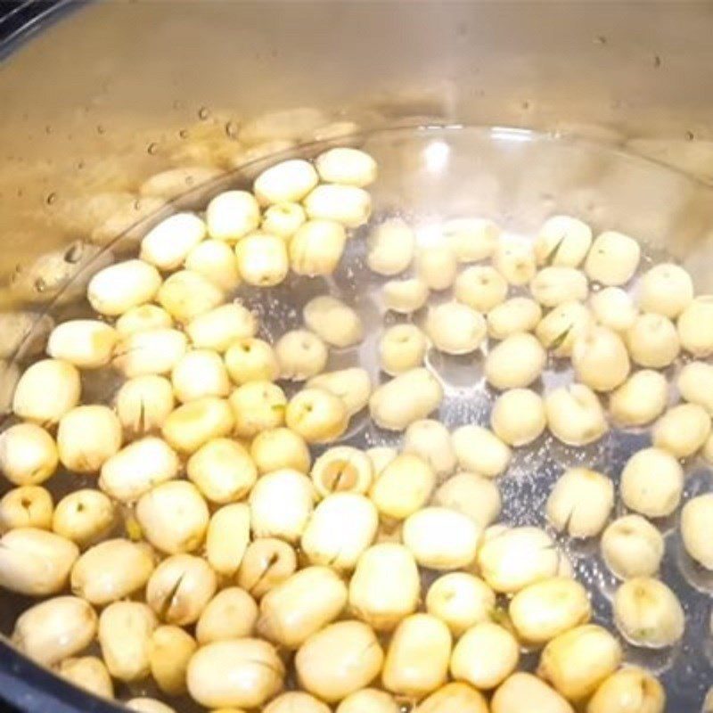 Step 1 Boil lotus seeds for Rambutan and lotus seed dessert