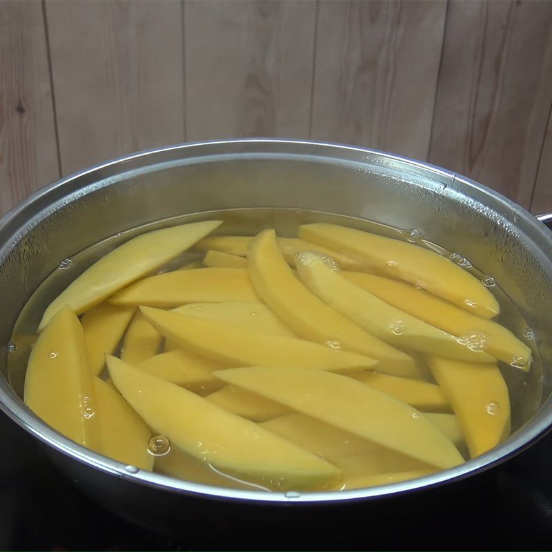 Step 2 Blanch the mango Mango with chili salt and sugar