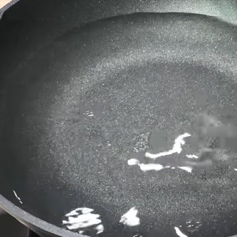 Step 2 Boil the cauliflower for stir-fried cauliflower with mushrooms