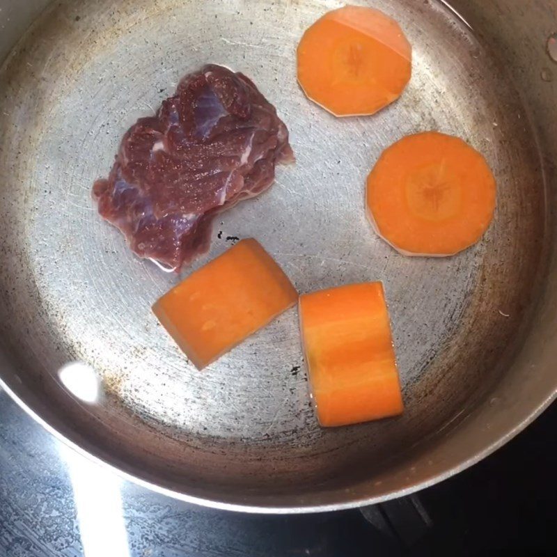 Step 2 Boil beef with carrots Beef porridge with water spinach for baby weaning