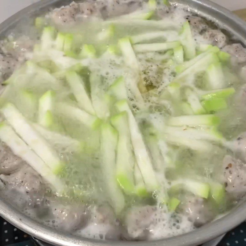 Step 3 Cooking Soup Fish Cake Soup with Bottle Gourd