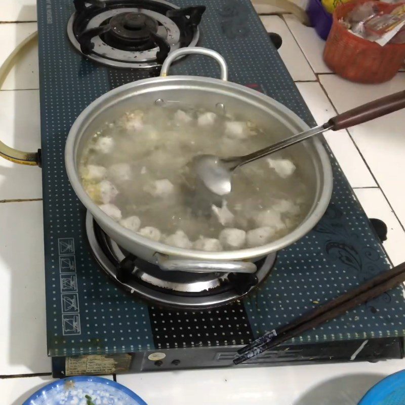 Step 3 Cooking Soup Fish Cake Soup with Bottle Gourd