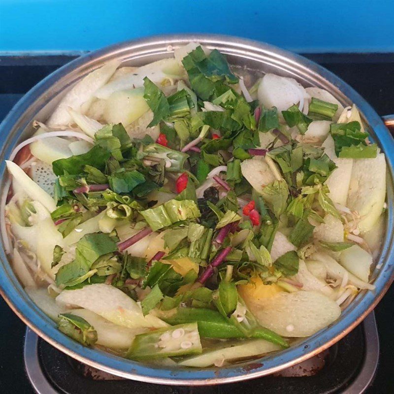 Step 3 Cook the soup Sour soup with red tilapia