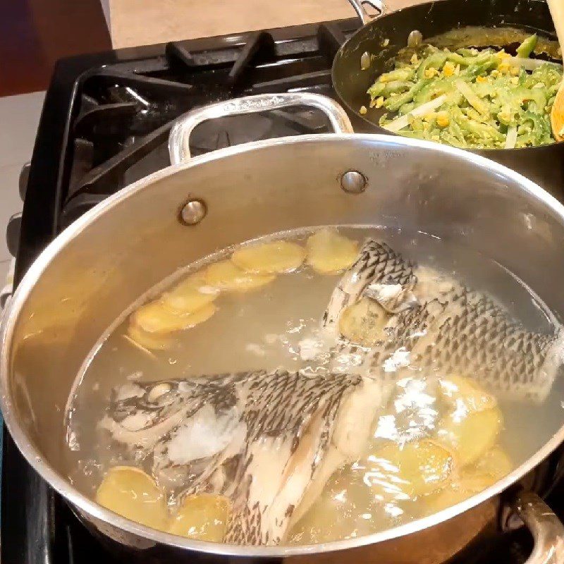 Step 3 Cooking frog fish soup with mustard greens Mustard greens soup cooked with frog fish