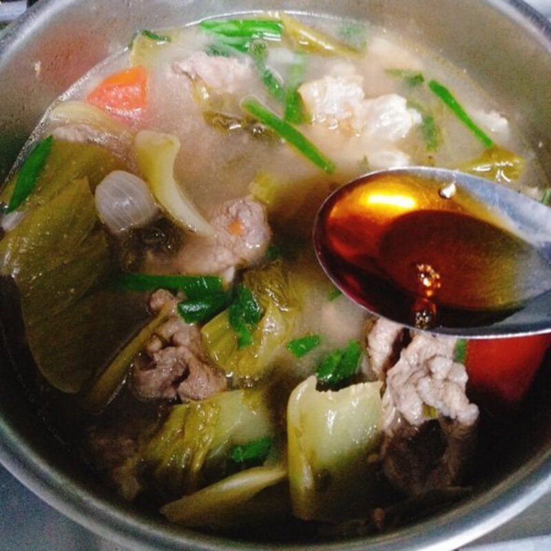 Step 3 Cooking sour melon soup with beef and tần vegetables