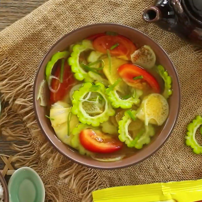 Step 4 Cook bitter melon and dọc mùng soup Sour bitter melon soup with vegetarian dọc mùng