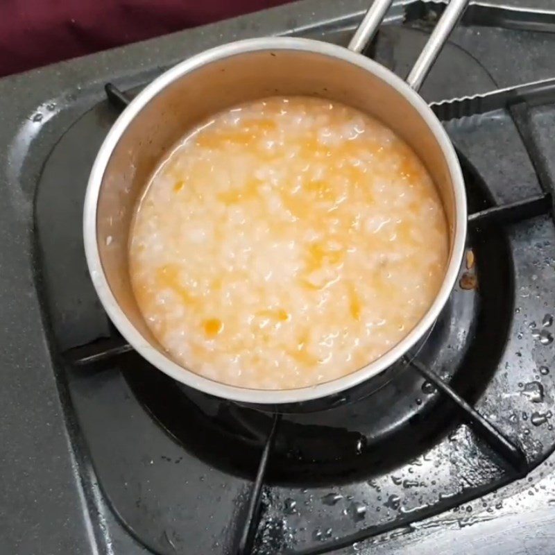 Step 3 Cooking porridge Snakehead fish carrot porridge