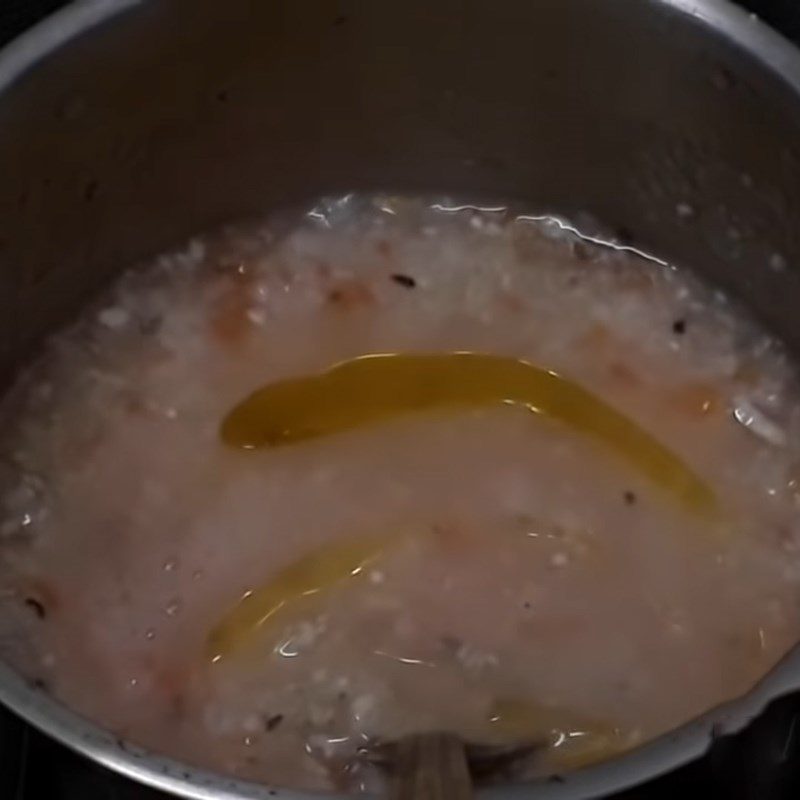 Step 2 Cooking eel tomato porridge Eel tomato porridge