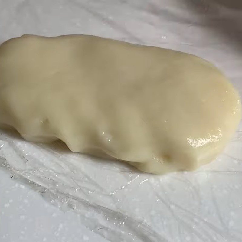 Step 4 Cook and stuff the dough skin for the sticky rice cake with lotus seed filling