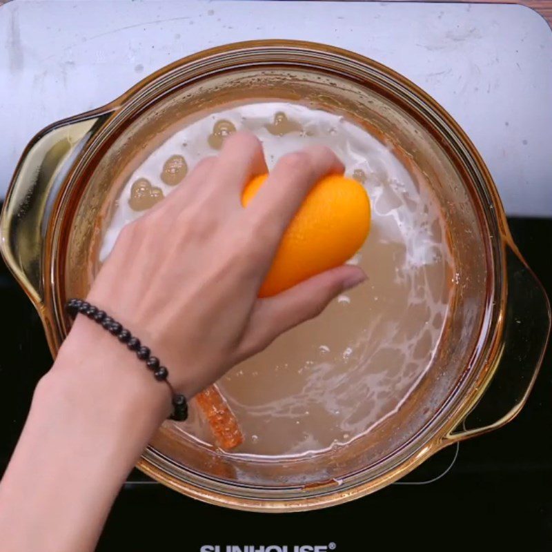 Step 1 Cook the mixture of cinnamon, orange, and clove syrup for hot gluhwein