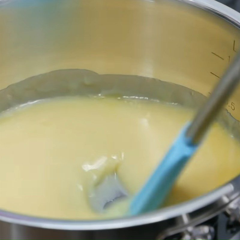 Step 1 Cook milk with butter Multi-colored Raffaello Cake