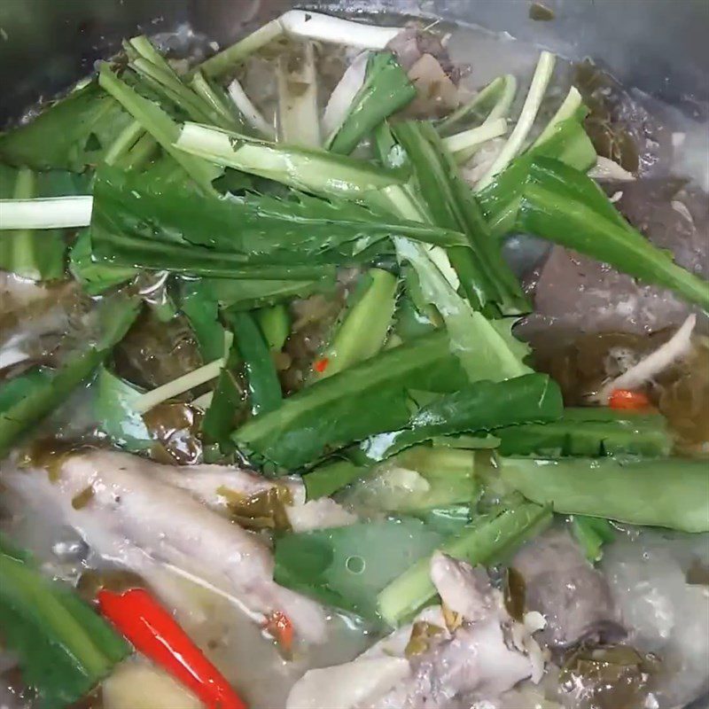 Step 4 Cook duck meat with giang leaves Duck cooked with giang leaves